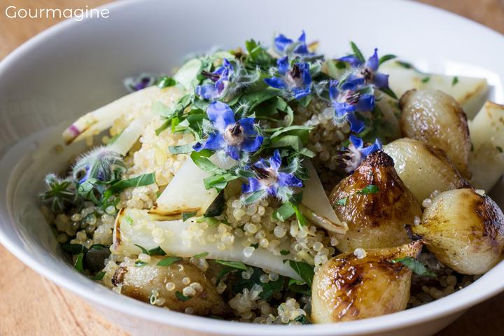 A bowl filled with quinoa and kohlrabi
