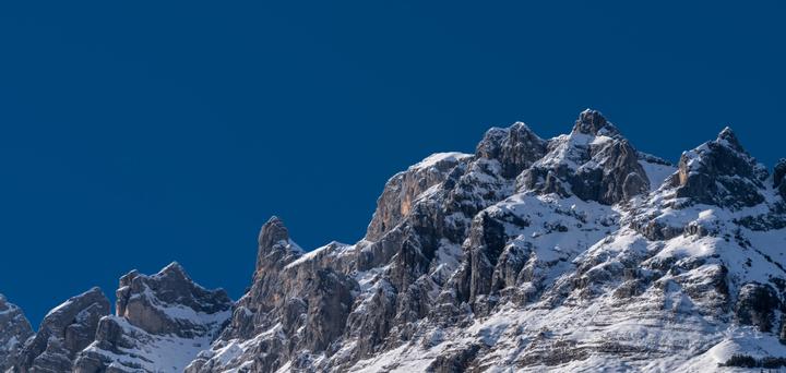 Mountain with snow and blue sky