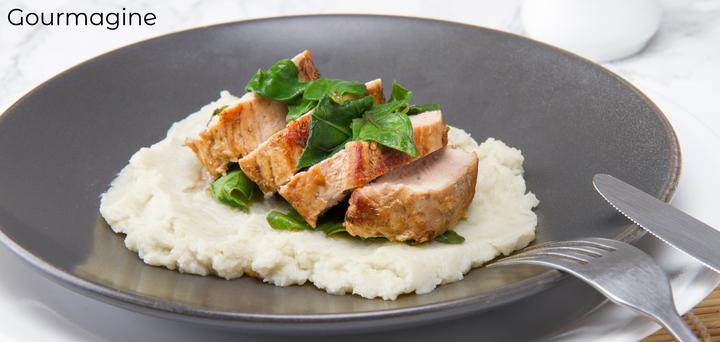 Image of a plate with cut pork and tasty cauliflower puree